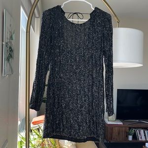 Glam long sleeve mini dress with open back